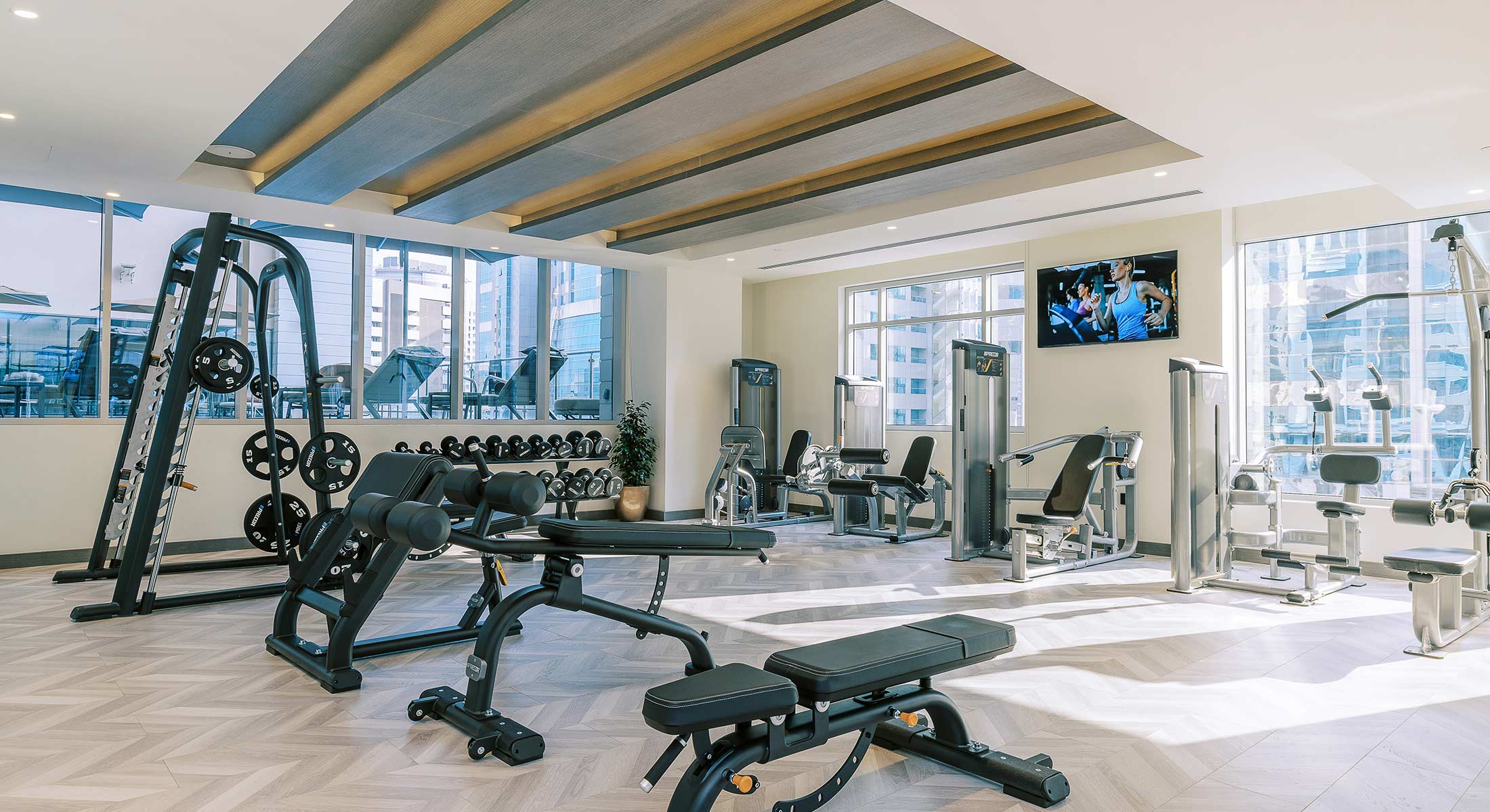 State-of-the-art gym facilities at Khalidia Palace Hotel Dubai, featuring modern equipment and a spacious workout area.